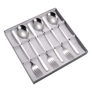 Set moderne de 6 cuillères et fourchettes en inox avec manches blancs dans un coffret cadeau