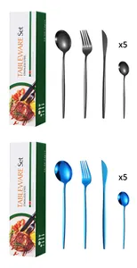 Detail of matte black and polished blue stainless steel cutlery set in a modern gift box