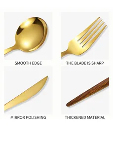 Detail of gold stainless steel cutlery with wood handles and mirror polished edges