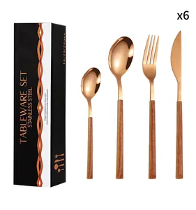 Détails de ménagère 24 pièces or rose avec manche aspect bois dans son coffret luxe
