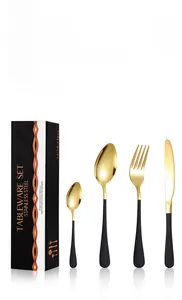 Detailed close-up of 24-piece stainless steel cutlery set in a premium black gift box