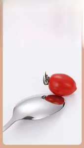 Mirror-polished stainless steel spoon with clear reflection and high-gloss finish details