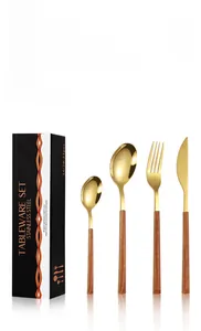 Detailed 16-piece gold stainless steel cutlery set with wooden handles in elegant gift box