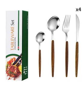 Détail de couverts en acier inoxydable avec manches ergonomiques à grain de bois foncé