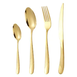 4-piece gold stainless steel cutlery set with elegant diamond pattern embossed handles
