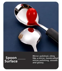 Close-up of a hand-polished mirror-finish stainless steel spoon with a black handle