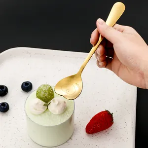 Golden heart-shaped stainless steel spoon with Happy Family engraving for dessert and coffee