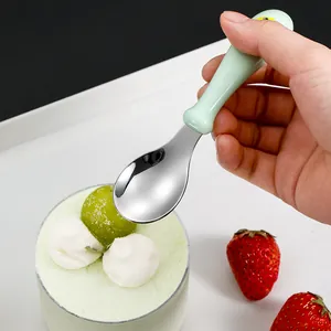 Green cartoon training spoon for kids made of 304 stainless steel with smooth handle