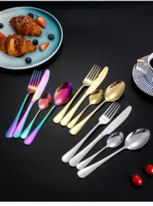 Close-up of luxury 4-piece stainless steel cutlery set in gold, silver, and rainbow colors
