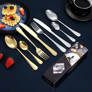 24-piece golden and silver stainless steel cutlery set with mirror finish and gift box