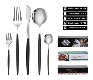Detail view of 30-piece stainless steel cutlery set with black handles and gift boxes