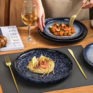 Golden stainless steel cutlery set with steak knife and fork for luxury dining