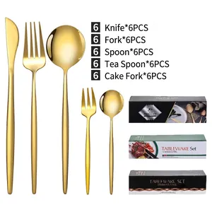 30-piece gold stainless steel cutlery set with assorted gift boxes on white background