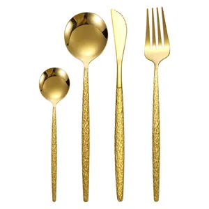 24-piece gold stainless steel cutlery set with elegant hammered texture handles