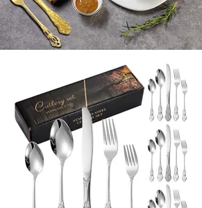 Vue détaillée du service de couverts vintage en inox avec motifs floraux en relief