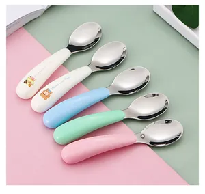 Detail of colorful 304 stainless steel baby spoons with ergonomic bear cartoon handles