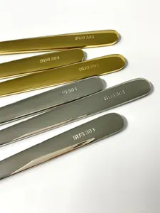 Detail of 304 stainless steel cutlery handles with SUS 304 engraving in gold and silver