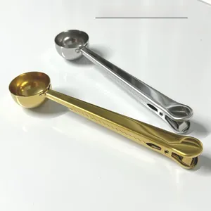 Detail of 304 stainless steel coffee scoops showing serrated sealing clips on the handles