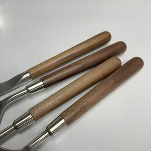 Macro detail of vintage 304 stainless steel cutlery with solid walnut wood handles