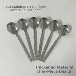 Detailed close-up of 304 stainless steel spoons with bark and daisy texture handles
