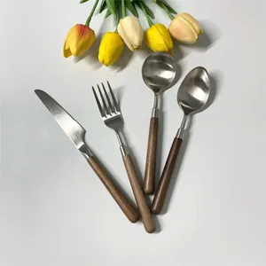 4-piece stainless steel cutlery set with walnut wood handles for home and restaurant dining