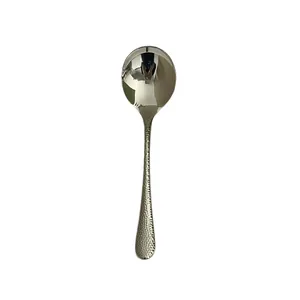 Polished 304 stainless steel round spoon with a textured hammered handle on white background