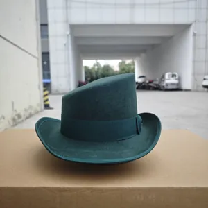 Detail of dark green wool felt hat with asymmetrical crown and ribbed ribbon band