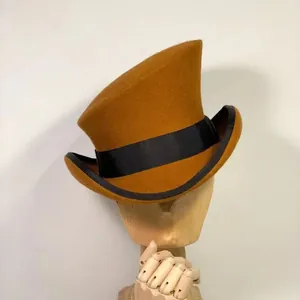 Classic pure wool top hat in mustard yellow with black ribbon and asymmetrical crown