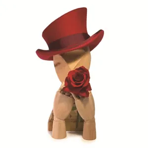 Classic red wool felt top hat with elegant satin ribbon on a minimalist white backdrop