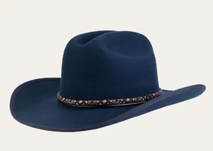 Detail of blue wool western cowboy hat featuring ethnic pattern decorative band