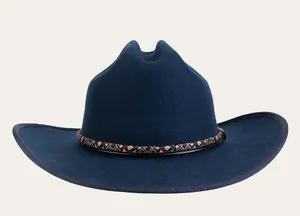 Detail of dark blue wool cowboy hat with colorful ethnic geometric patterned band