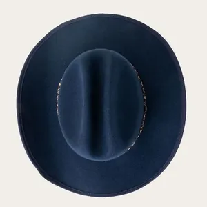 Navy blue wool wide brim cowboy hat with geometric ethnic style patterned hatband