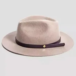 Close-up of wool fedora hat with a leather strap and gold metallic letter M buckle
