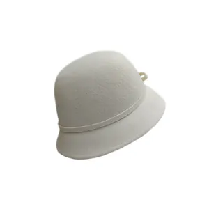 Elegant off-white wool felt cloche hat with a bow detail in French vintage style