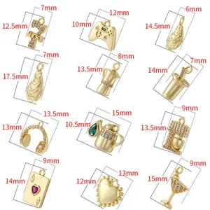 Collection of retro gold-plated charms including game controller and coffee pot designs
