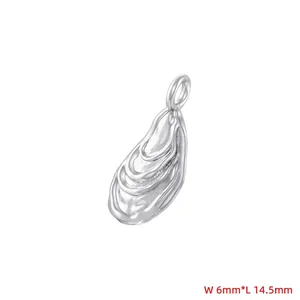 Detailed macro view showing the shell-shaped silver pendant with its 6mm width dimensions