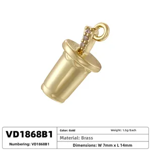 Detailed close-up of a cup-shaped brass pendant with zircons and 7x14mm size labels