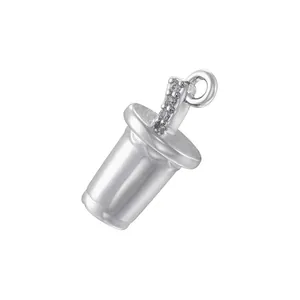 Detailed silver milk tea cup pendant with sparkling cubic zirconia on straw accent
