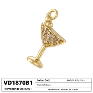 Detailed view of a golden cocktail glass pendant with zircon inlay and dimensions