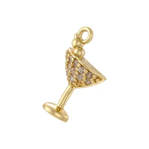 Close-up of a gold cocktail glass pendant with sparkling pavé-set cubic zirconia