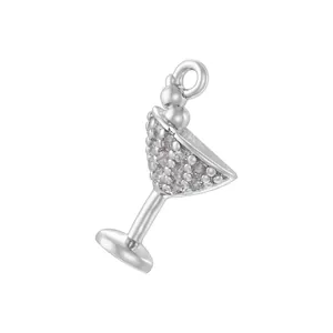 Detailed view of cocktail glass pendant with sparkling stones and silver-tone metal