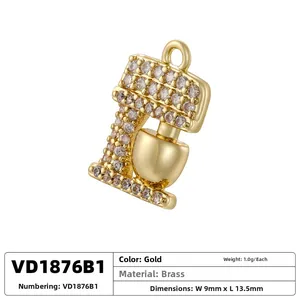 Detailed view of a gold-plated brass kitchen mixer pendant with sparkling cubic zirconia