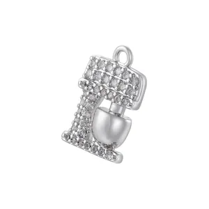 Macro shot of silver mixer pendant with sparkling cubic zirconia stones and metal ring