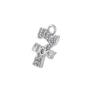Detailed macro view of the silver Lucky number seven pendant inlaid with zircons
