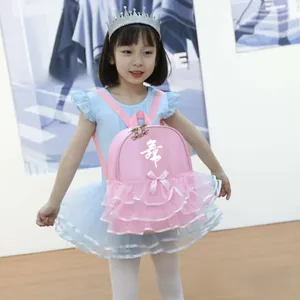 Pink ballet backpack for girls featuring a layered tutu skirt and white artistic font