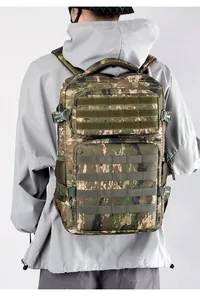 Detail of military tactical backpack with jungle camouflage and MOLLE expansion system