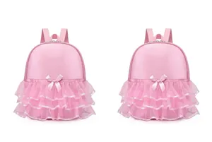 Detail view of pink ballet dance backpack with layered lace tutu skirt and bow accents