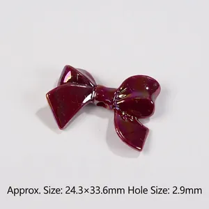 Deep wine red bow-shaped resin bead with aurora finish for DIY jewelry crafting 24mm