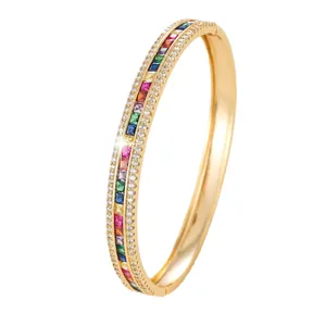 Luxury gold-plated hinged bangle featuring rainbow square-cut zircons and micro-pave stones