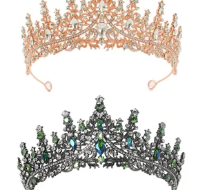 Close-up of gothic black tiara with green rhinestones and rose gold bridal crown